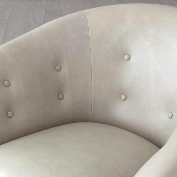 Mimi grey leather chair closeup